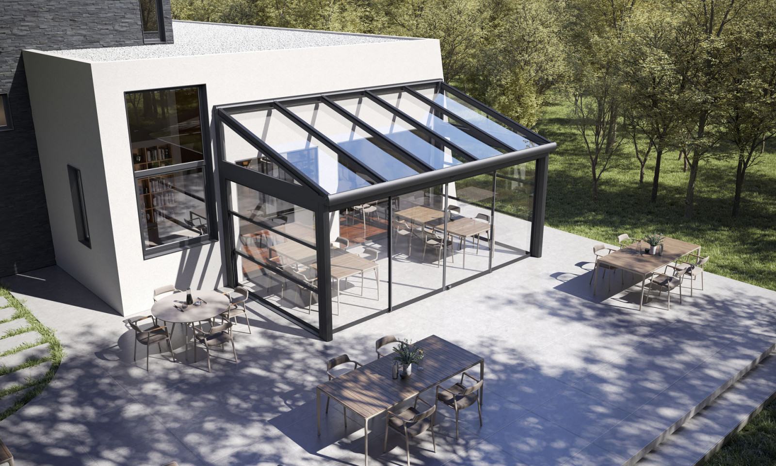 Terrace with an integrated sloped glass roof winter garden and large glass façades